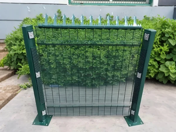 A small green clear view fence with taper post.
